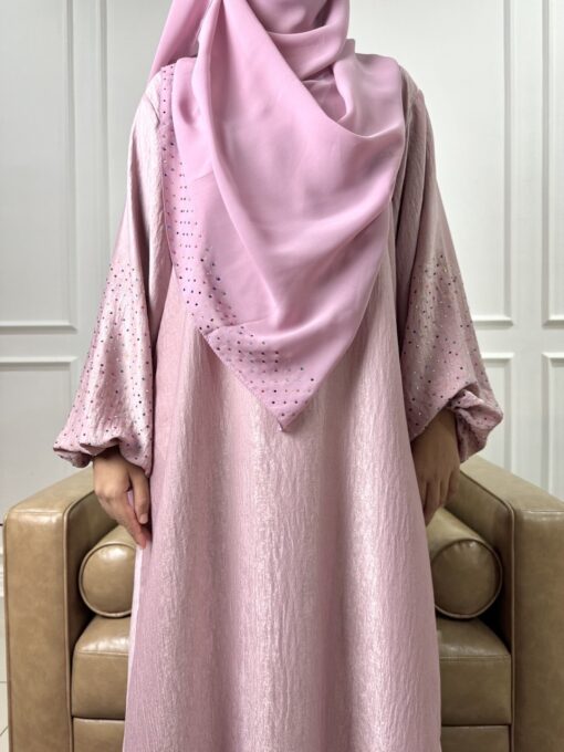 Khadija, in pastel pink